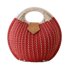 Shell and rattan - woven handbag