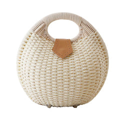 Shell and rattan - woven handbag