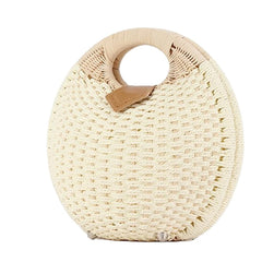 Shell and rattan - woven handbag